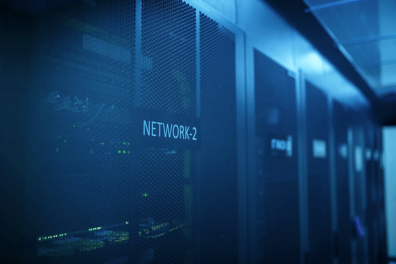 Network rack with blue status lighting in a data centre
